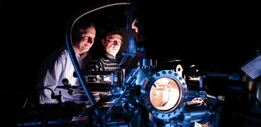 Researchers conducting chemistry experiment