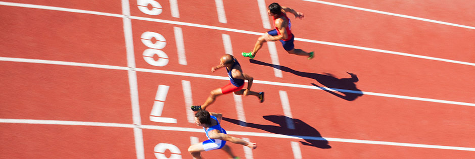 Athletics track with sprinters competing