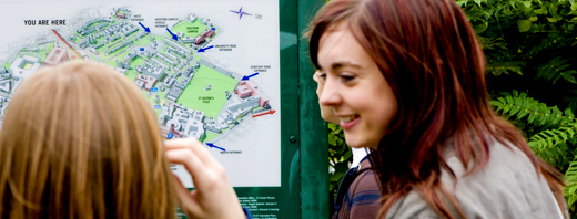 Students looking at campus map 