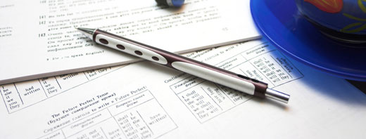 papers with pen and coffee
