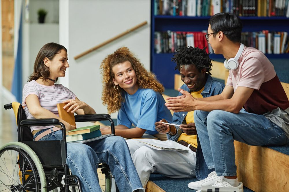 A group of 4 diverse students talking