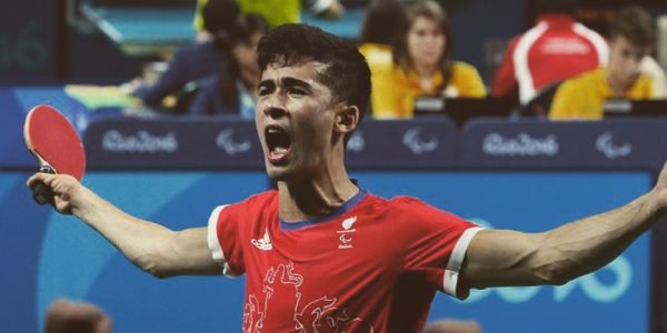 Kim Daybell celebrates during a table tennis match