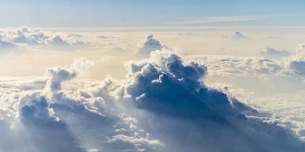 Dramatic clouds in the sky, seen from above the clouds
