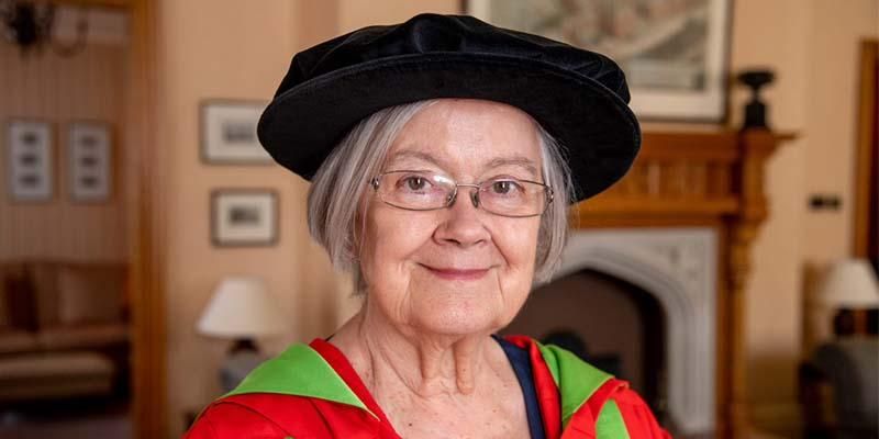 Headshot of Brenda Hale in a graduation gown.