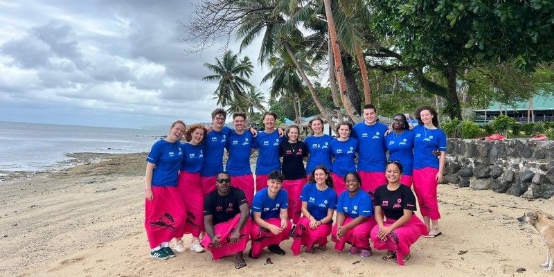 The University of Leeds Think Pacific cohort of students on a beach in Fiji.
