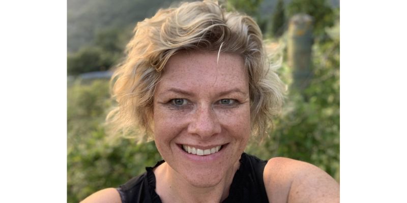 Image of Professor Karen Burland. A woman with short blonde curly hair