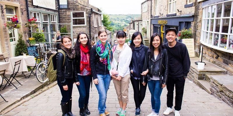 Leeds International Summer School students on a high street in Howarth