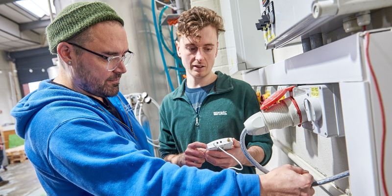 Professor Nik Watson and Dr Alexander Bowler inspect equipment at the Piglove brewery in Leeds