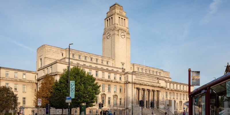 The Parkinson Building at the University of Leeds against a clear, blue sky.