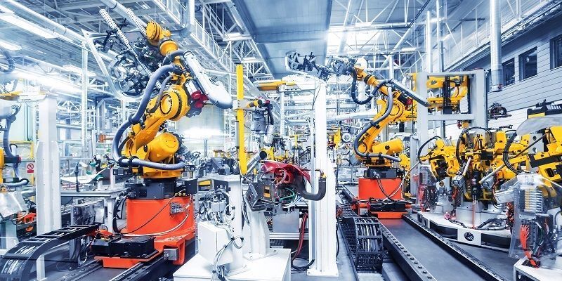 A modern, robotic production line in a car factory