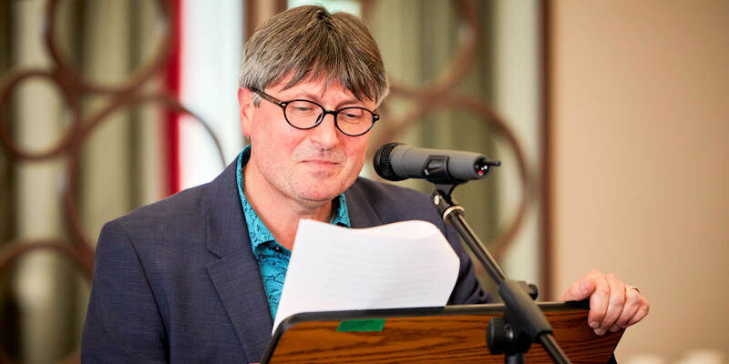 Simon Armitage prepares to announce the winning poet.