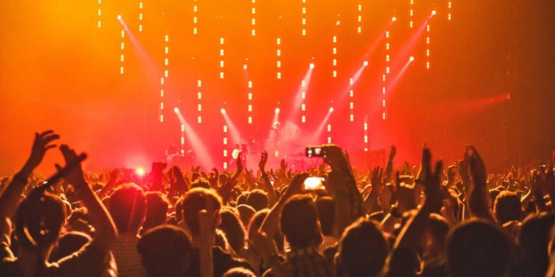 An audience enjoys a rock concert. Photo by anna-m.w. from Pexels.com