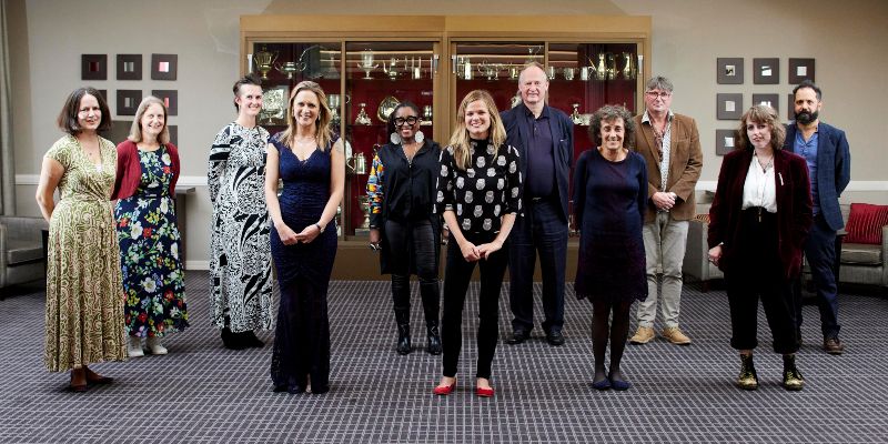 Lauren Pope, the winner of the Brotherton Poetry Prize, standing in a group with judges and other shortlisted poets