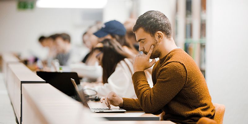 students on laptops