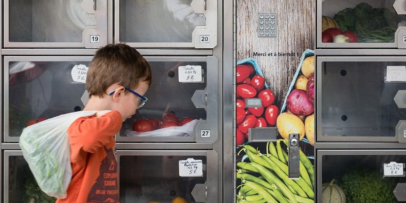 child with fruits and veg