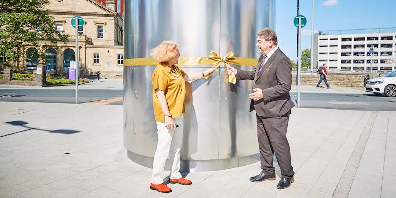 Liliane Lijn and Dennis Hopper perform the honours at an event to formally switch on Converse Column, the University of Leeds' new public artwork