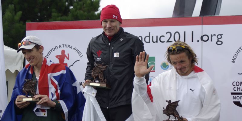 John Pares stands atop the podium having won Commonwealth gold