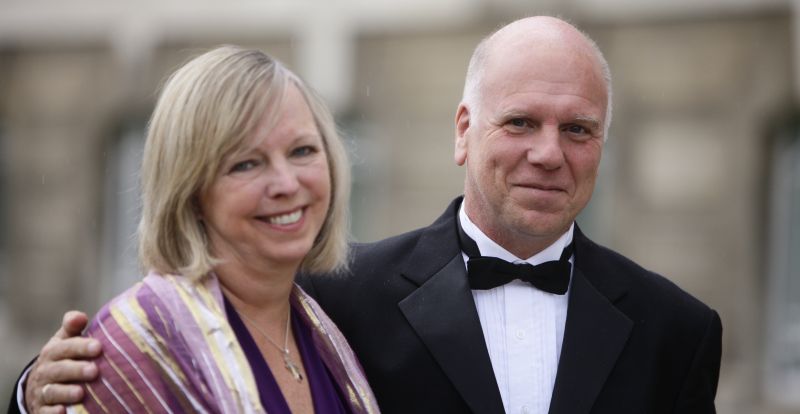 Peter Robinson and his wife Sheila stand together at a black tie event