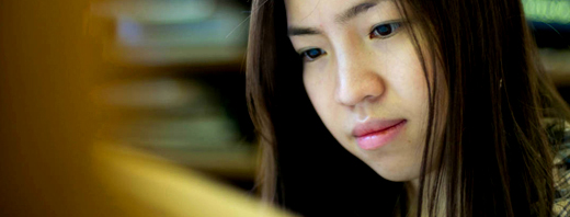Student reading through notes 