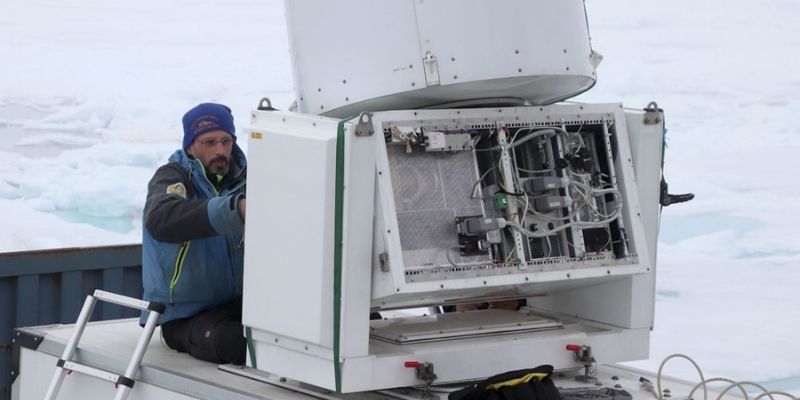 Ian Brooks operating a cloud radar machine