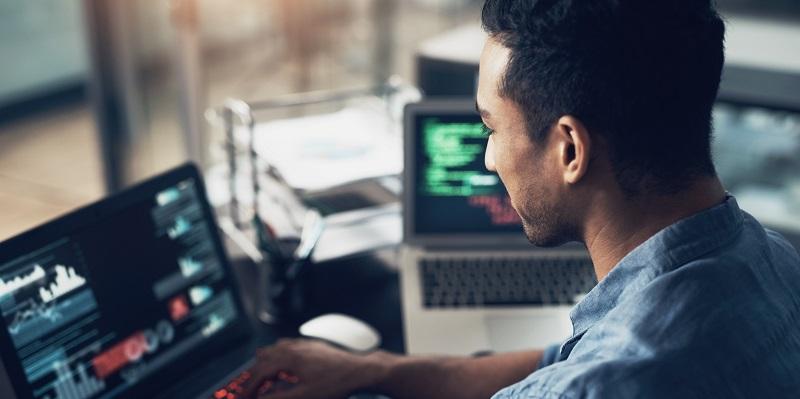 Computer operator at a screen