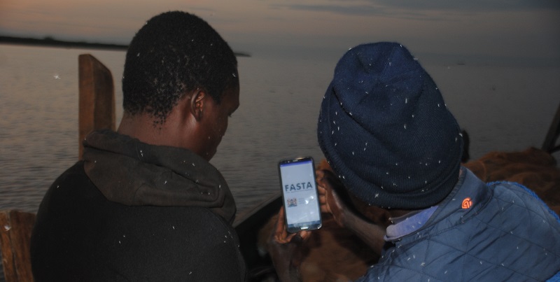Fishermen check the weather on the FASTA app before taking to the water