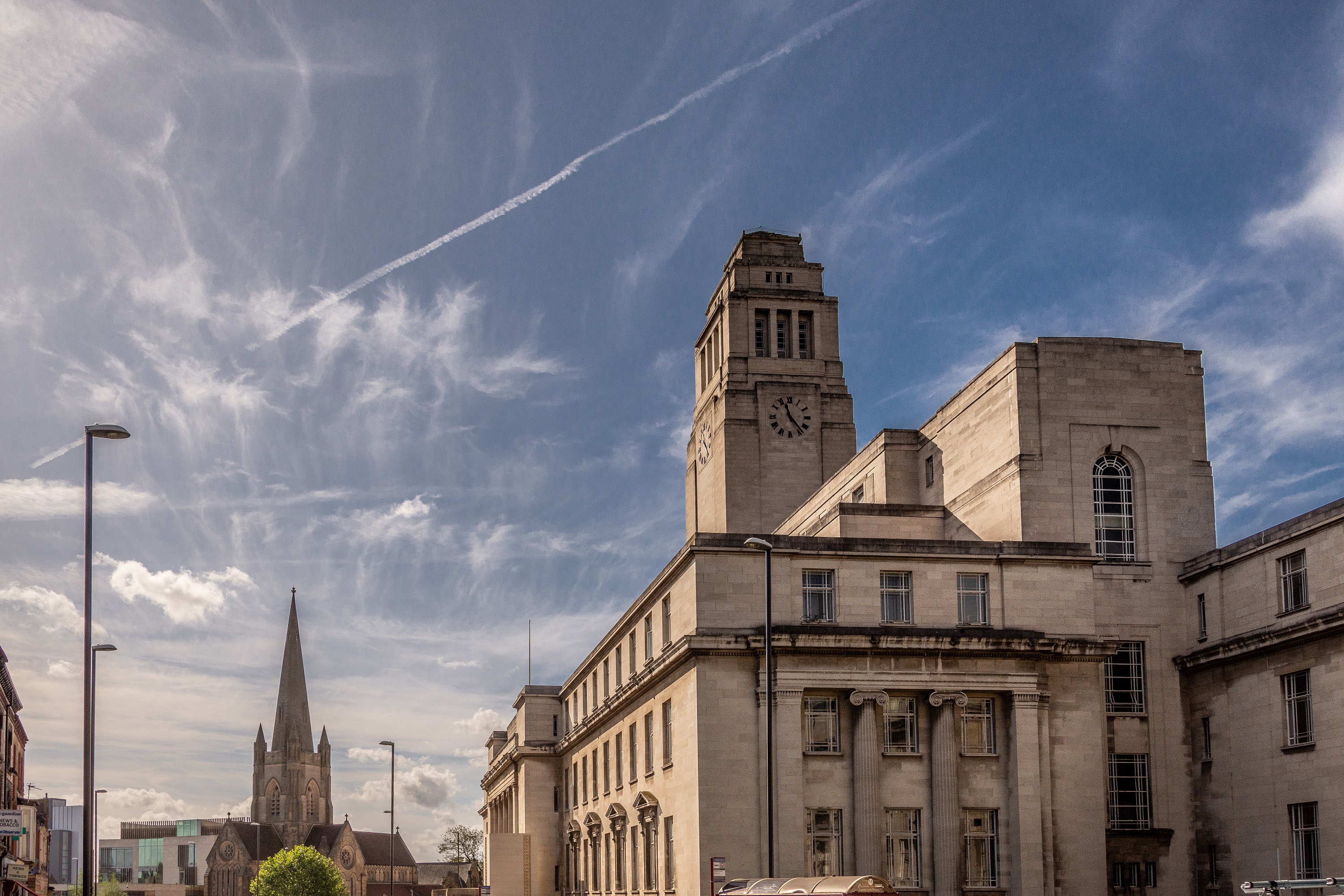 The Parkinson Building, the University's iconic white monolithic building that sits at the front of campus with a tall white clock tower in the centre.