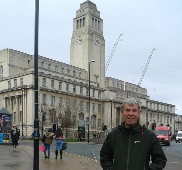 Peter Cullimore stands in front of Parkinson Building