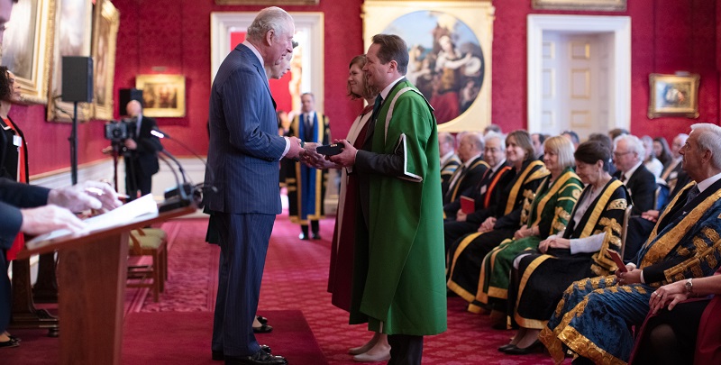 Prince Charles and Princess Anne present Professor Nick Plant and Dr Amanda Maycock with the Queen's Anniversary Prize