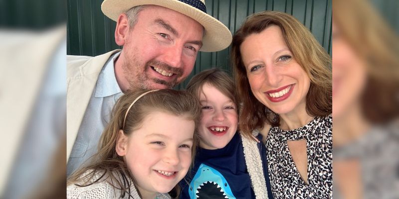 Peter Smallbone, his wife Laura and their two children pose smiling in a selfie