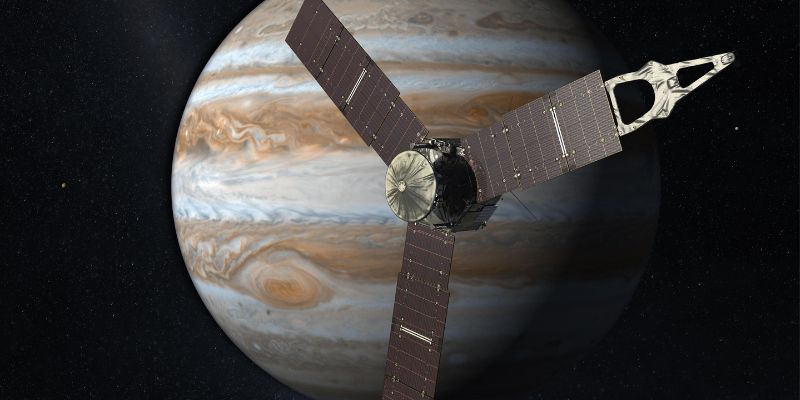 An image of the Juno satellite passing the planet Jupiter