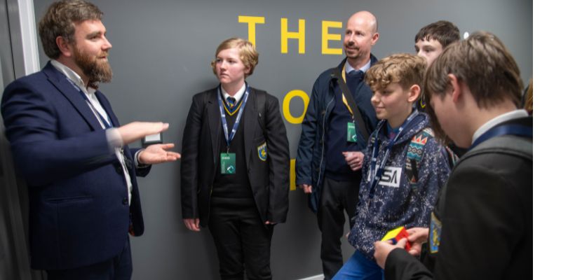 Dr Andy Lee shows school pupils around the Sir William Henry Bragg building. Edward Hesketh, 13, pictured centre in blue trousers.