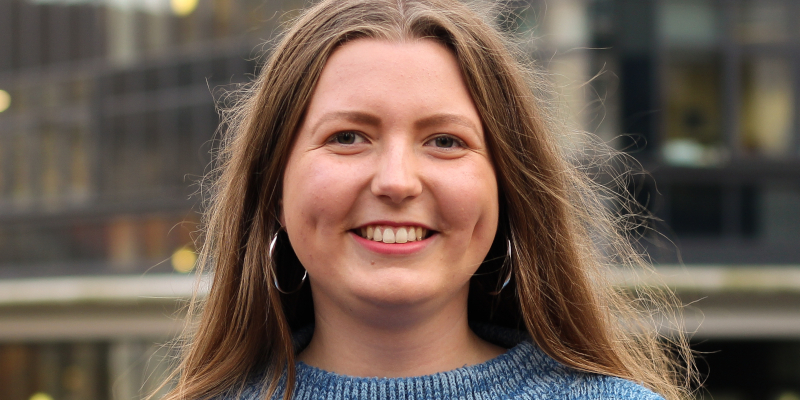 Photo of a young woman smiling