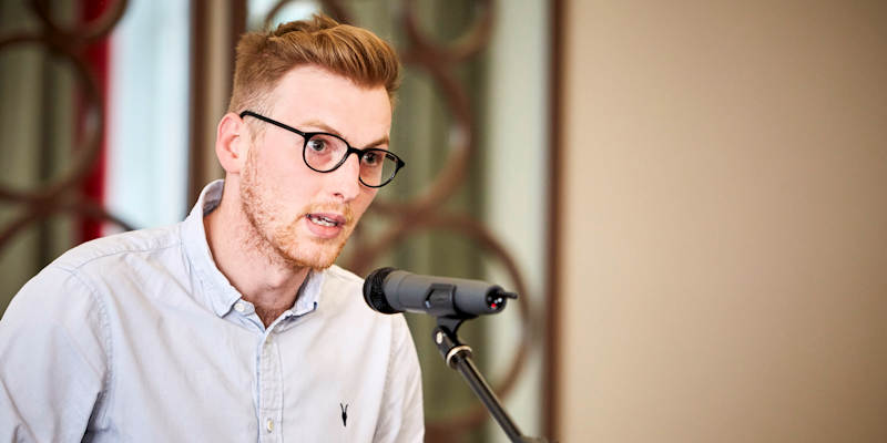 Winning poet Dane Holt reads one of his poems at last night's award ceremony