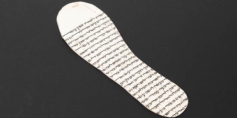 The leather sole of a child’s shoe, crudely cut from a Jewish religious parchment scroll – a Sefer Torah