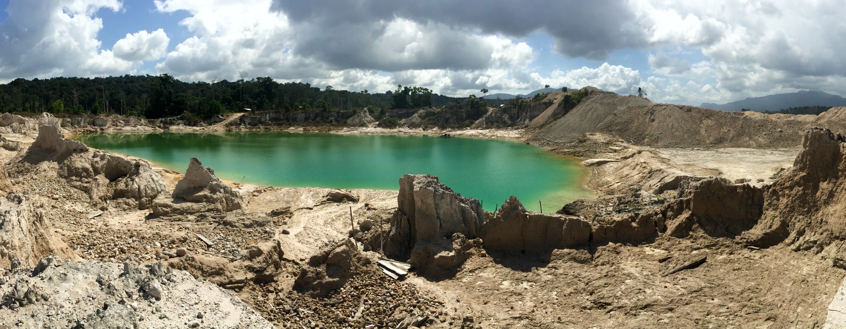 Tailing pond and mining pit landscape at mining site near Mahdia, Guyana 