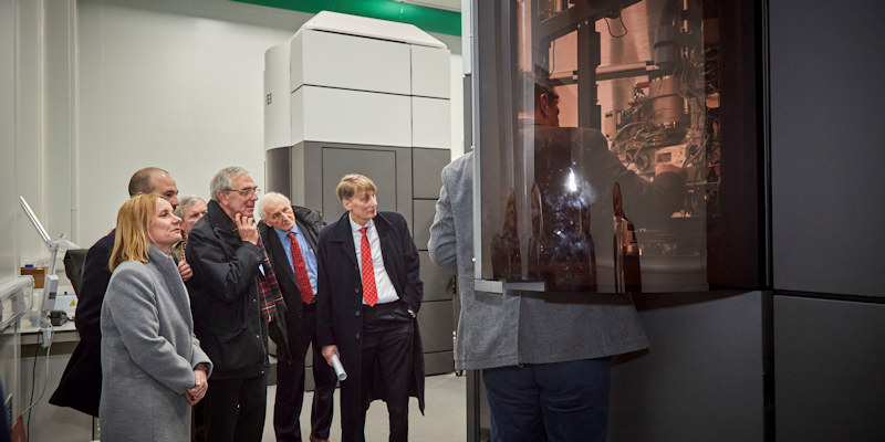 CRUK senior leaders looking at the University of Leeds cryo-electron microscopes