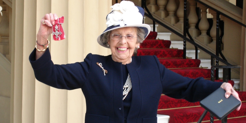 Marjorie Ziff with her MBE at Buckingham Palace