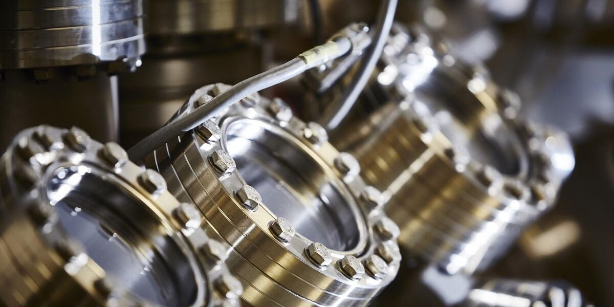 A close up of the windows into the vacuum chamber of the molecular beam epitaxy equipment.