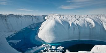 A Greenland melt stream - deeply incised melt channel that transports the overflow from a large melt lake to a Moulin.