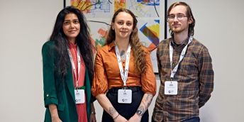 Dr Sania Wadud, Polly Foster, Bailey Andrew stood smiling at the camera.