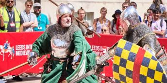 Swordsmen demonstrate 15th century armed combat.
