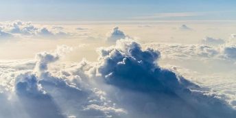 Dramatic clouds in the sky, seen from above the clouds