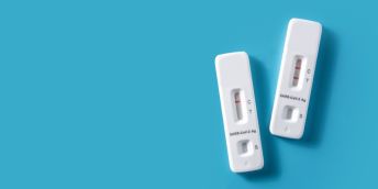 a positive and a negative covid test