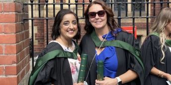 Raj Cowles and Kathleen Richards at their graduation