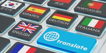 a keyboard with each key designated a national flag and the name of the country below the flag, in that country's language. There is also a large blue button that says 'translate'.