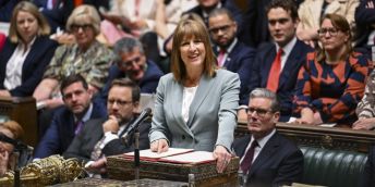 Rachel Reeves standing at the dispatch box in the House of Commons