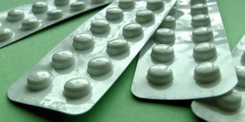 tablets on a green background