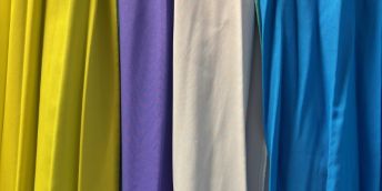 A range of dyed polyester fabric in different colours