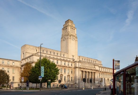 A photo of Parkinson Building on campus with blue sky in the background.